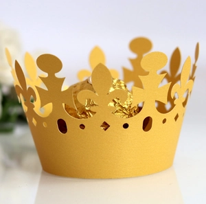 Laser-cut gold crown cupcake wrapper with intricate hollow design for luxury desserts