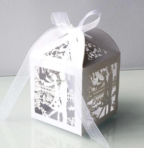 Detailed laser-cut wedding favor box with Love text and romantic couple silhouette