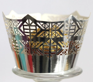 Silver laser-cut geometric cupcake wrapper with mirror finish for party dessert decoration