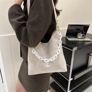 Minimalist beige hobo bag for women featuring a chunky white resin chain and large capacity