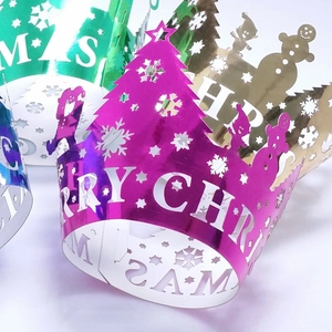 Metallic Christmas cupcake wrappers with laser-cut Christmas tree and snowflake patterns