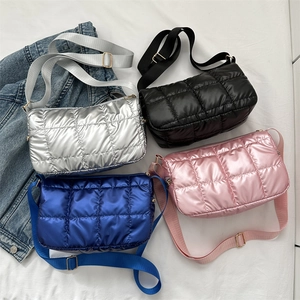 Quilted puffer shoulder bags in metallic silver, black, electric blue and pink colors