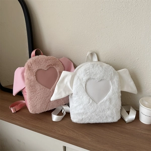Cute plush heart backpack in pink and white faux fur with adjustable straps for kids