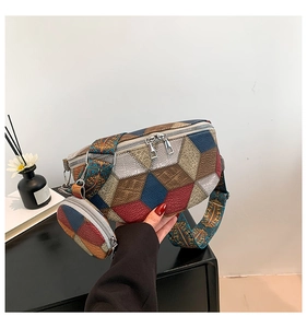 Detail of colorful geometric leather waist bag with double zippers and ethnic strap