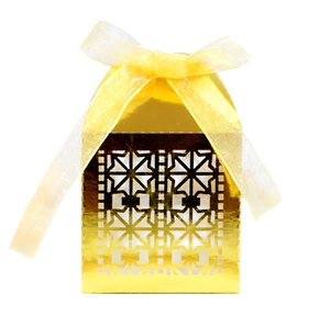 Golden laser-cut candy box with geometric patterns and yellow organza ribbon bow