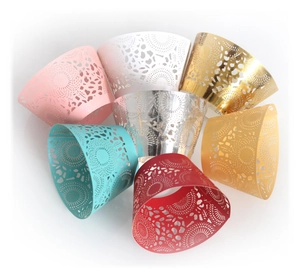 Lace laser-cut cupcake wrappers in diverse colors with intricate floral patterns