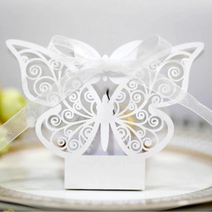 Elegant white laser-cut butterfly gift box with ribbon for weddings and party favors