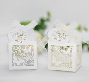 Detailed laser-cut butterfly ivory gift box with thank you tag and elegant ribbon