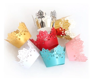 Laser cut hollow crown cupcake wrappers in gold, silver, red, white, blue and pink