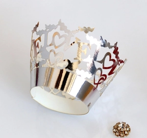 Silver mirror laser cut cupcake wrapper with LOVE heart pattern and rhinestone detail