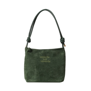 Minimalist dark green suede tote bag with yellow embroidery and knot shoulder strap