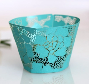 Lace flower laser cut cupcake wrapper in lake blue pearlescent paper for cake decoration