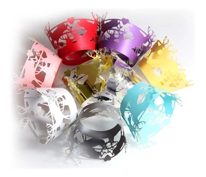 Laser-cut Christmas reindeer cupcake wrappers in various pearl and metallic colors