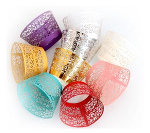 Laser cut lace cupcake wrappers in various metallic colors for dessert table decoration