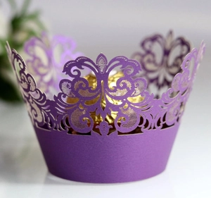 Purple laser-cut lace cupcake wrapper with elegant crown pattern for wedding decor