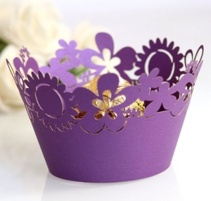 Detailed laser-cut purple cupcake liner with sunflower hollow pattern for wedding party