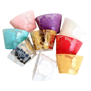 Lace cupcake wrappers with laser cut rose patterns in multiple metallic colors