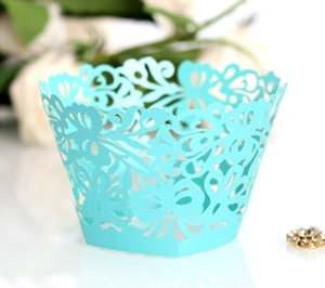 Sky blue laser cut cupcake wrappers with butterfly floral patterns for party decoration