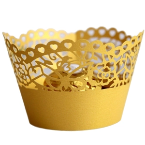 Golden laser-cut lace cupcake wrappers with elegant hollow heart and floral patterns