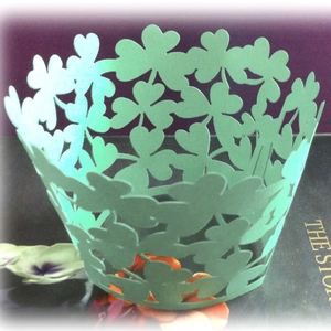 Mint green laser cut four-leaf clover cupcake liners for wedding party decorations