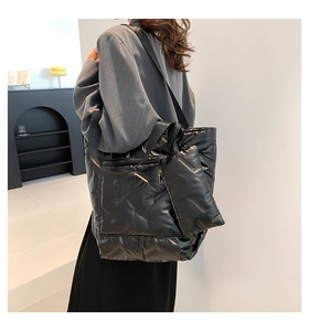 Quilted tote bag set with matching small pouch in black silky puffer material