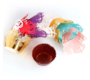 Lace hollow cupcake wrappers in multiple colors with crown and carriage laser cut designs
