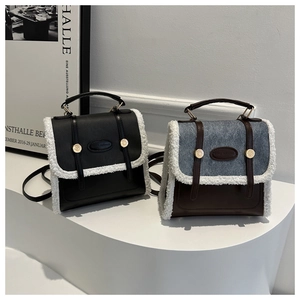 Detail of lamb wool trim and leather patchwork on versatile 2-in-1 backpacks