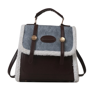 Vintage lamb wool patchwork backpack with dual handles and elegant brown leather trim
