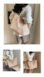 Detail of large beige woven tote bag showing durable straps and texture for daily use
