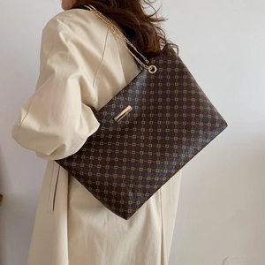 Vintage patterned large tote bag with gold chain strap in dark brown faux leather