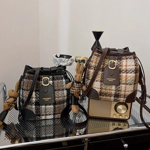 British style plaid wool bucket bag with drawstring closure and rabbit pendant accessory