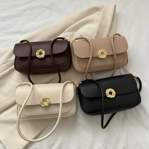 Sacs portés épaule chic en marron foncé, kaki, crème et noir avec boucles à nœud doré