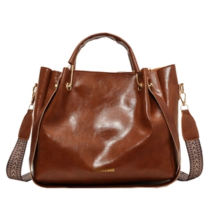 Borsa a secchiello vintage in pelle PU marrone con ampia tracolla intrecciata e oro finitura