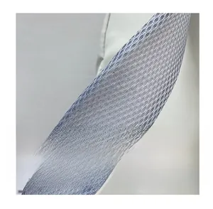 Close-up of thick honeycomb breathable mesh shoulder strap on large nylon backpack