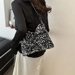 Sparkly black and white sequin shoulder bag with leather knotted strap for women