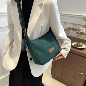 Green corduroy hobo shoulder bag with a small coin purse and fashion patch for women
