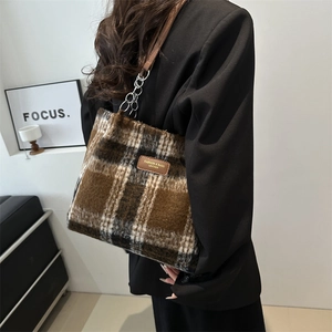 Brown and white plaid wool tote bag with leather straps and chain detail for women