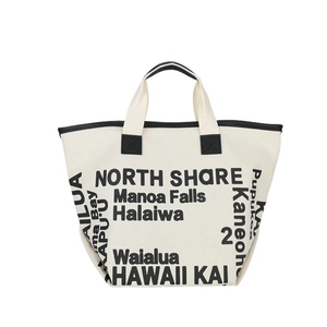 Minimalist canvas tote bag with black letter print and contrast handles on white backdrop