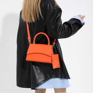 Orange faux crocodile leather handbag and crossbody bag set with gold hardware