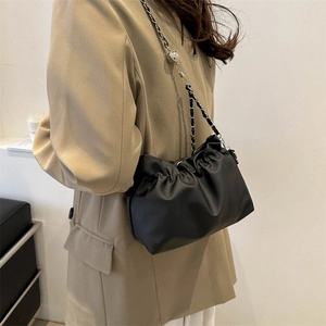 French pleated shoulder bucket bag with black leather and metallic chain strap