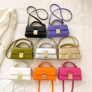 Chic solid color crossbody handbags with metallic round lock in eight vibrant colors