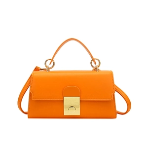 Bright orange minimalist crossbody handbag with gold square lock and top handle