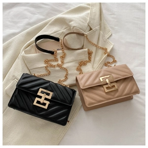 Quilted crossbody bags with V-shaped stitching and gold geometric buckle detail
