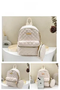 Quilted diamond pattern cream white oxford backpack with matching round coin purse detail