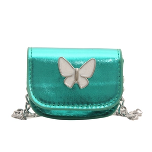 Mini glossy turquoise chain bag featuring a white butterfly and silver metal strap