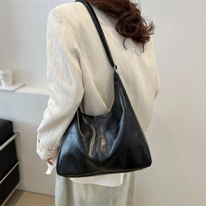 Classic black high-gloss hobo bag with vintage textured leather and large capacity