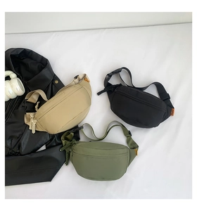 Three durable nylon waist bags in beige black and green with adjustable straps and zip pullers