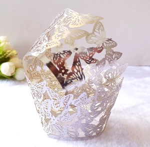Elegant laser-cut butterfly cupcake wrapper in pearl white and light gold finish