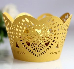 Laser cut yellow pearl paper cupcake wrapper with heart hollow patterns for weddings