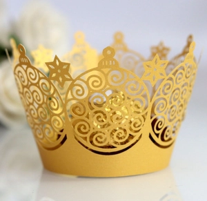 Elegant gold crown paper cake wrapper with intricate hollow laser-cut lace design